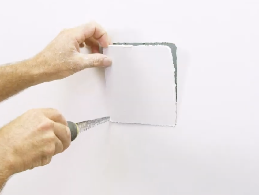 Cut the rectangular opening in the plasterboard wall using a utility knife or jab saw